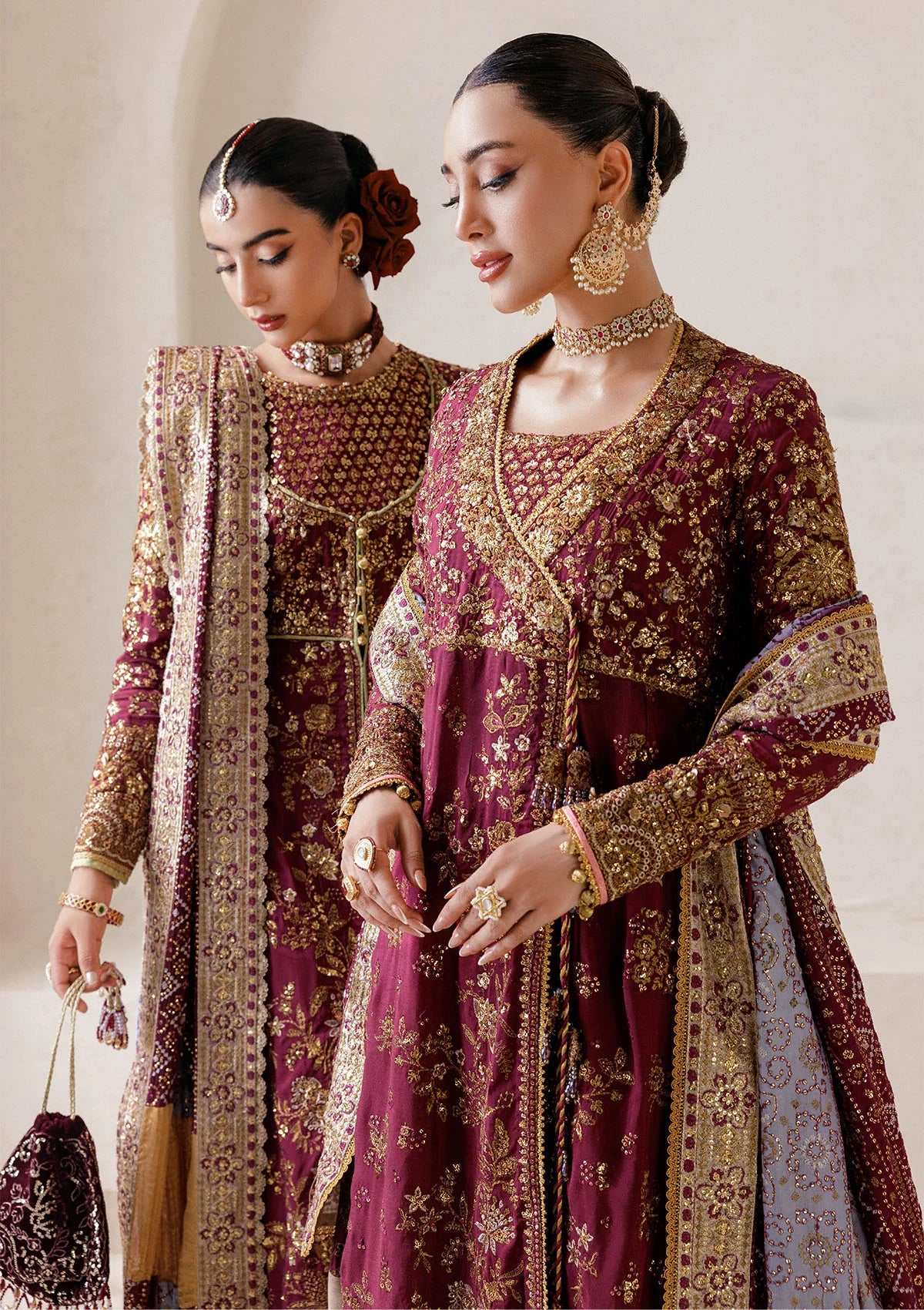 Opulent medium silk ensemble with detailed embroidery, bodice and panel work, jamawaar pants, and an embroidered silk dupatta. Styled as angrakha gharara or open-front koti sharara.