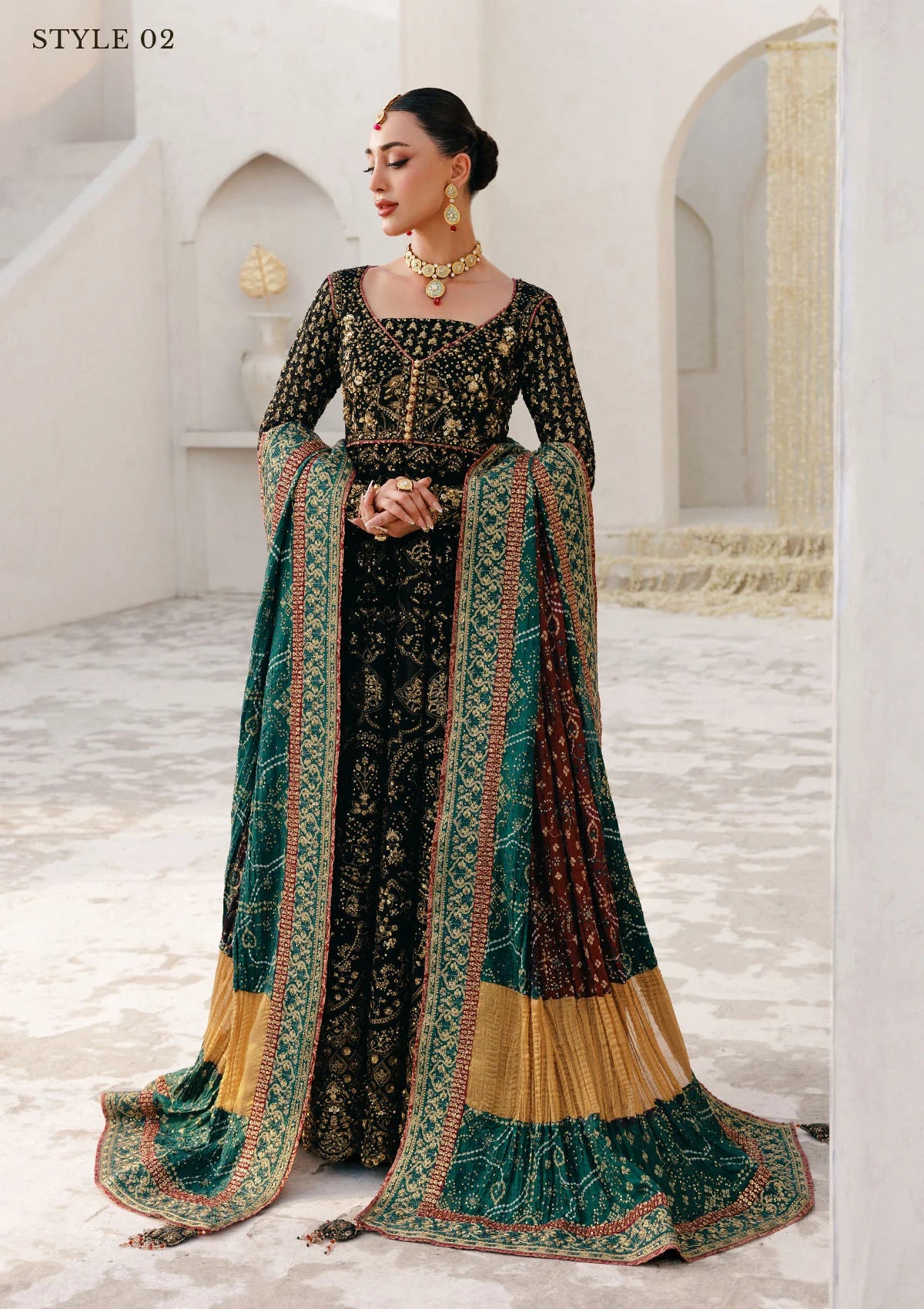 Elegant embroidered chiffon ensemble with embellished bodice, organza borders, masoori silk pants, and a medium silk dupatta. Styled as kalidar open front with sharara or koti kalidar with straight pants.