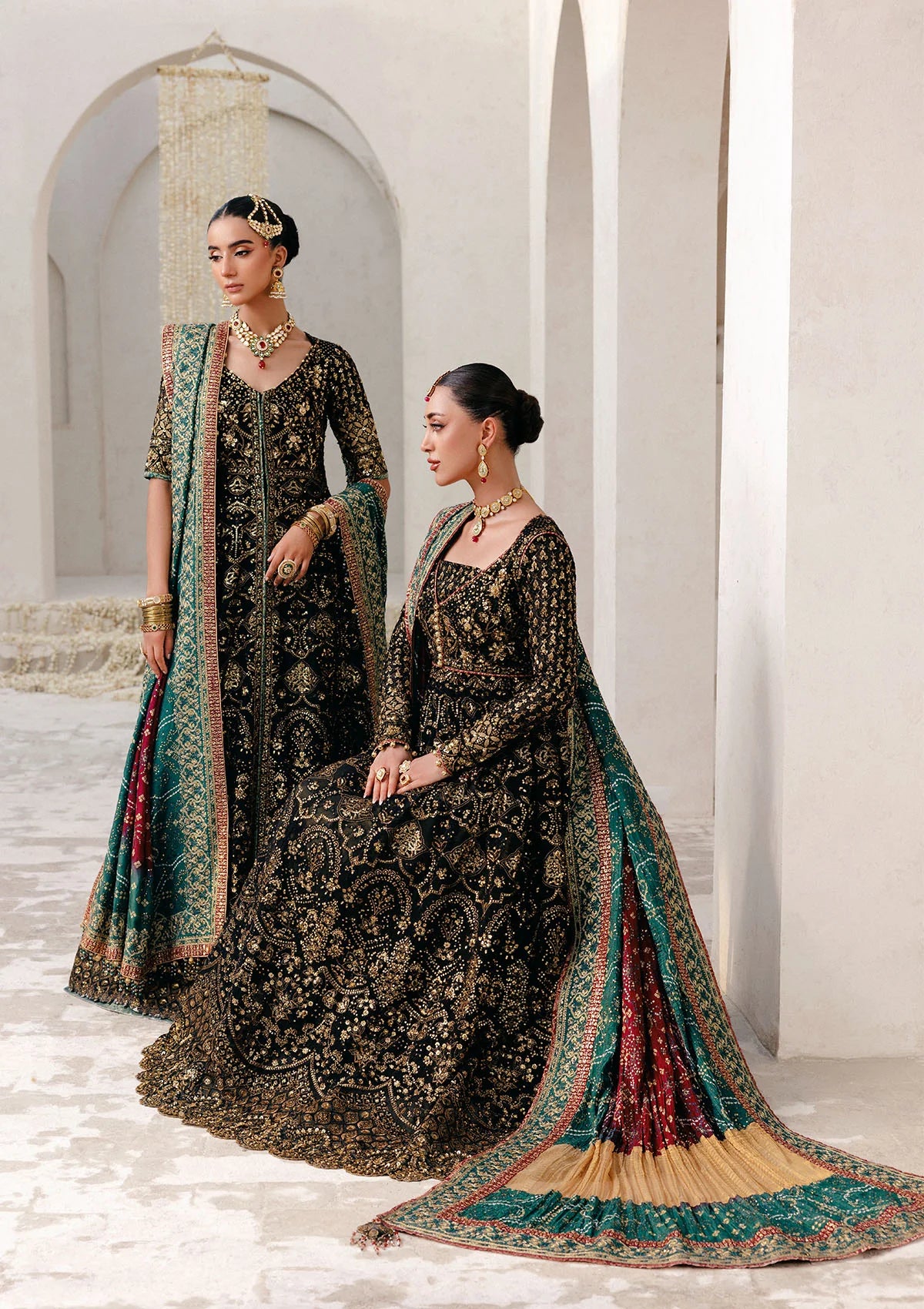 Elegant embroidered chiffon ensemble with embellished bodice, organza borders, masoori silk pants, and a medium silk dupatta. Styled as kalidar open front with sharara or koti kalidar with straight pants.