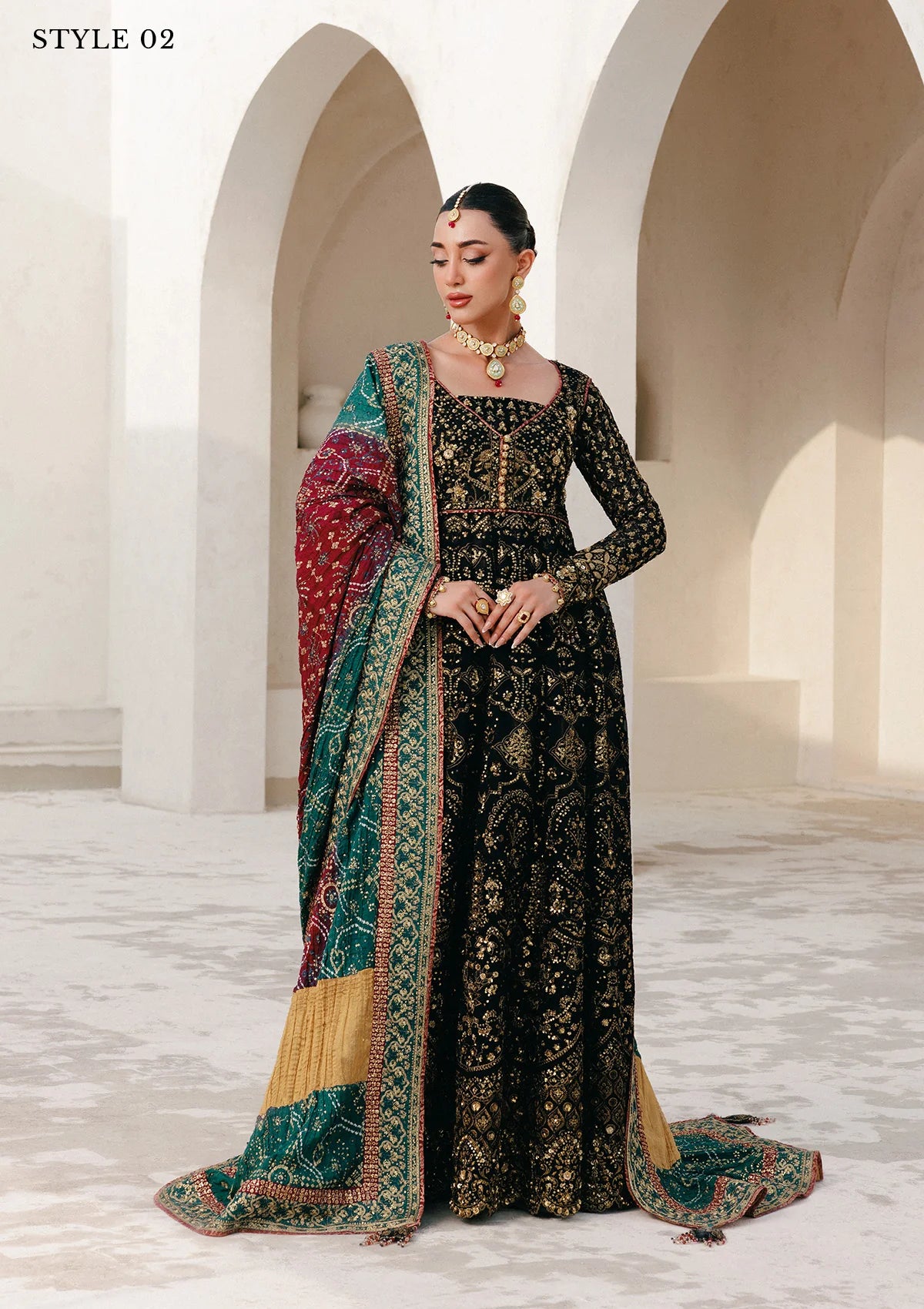 Elegant embroidered chiffon ensemble with embellished bodice, organza borders, masoori silk pants, and a medium silk dupatta. Styled as kalidar open front with sharara or koti kalidar with straight pants.