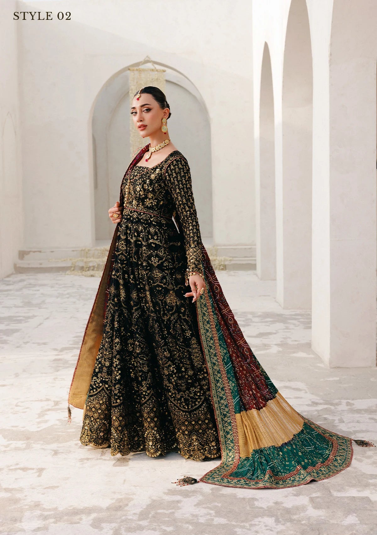 Elegant embroidered chiffon ensemble with embellished bodice, organza borders, masoori silk pants, and a medium silk dupatta. Styled as kalidar open front with sharara or koti kalidar with straight pants.