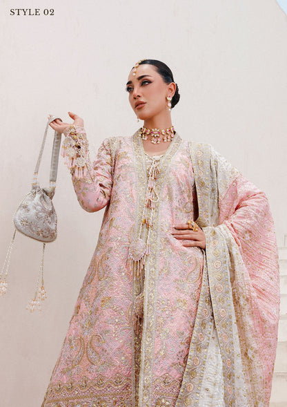 Refined katan silk ensemble with embroidered yoke, embellished borders, masoori silk pants, and a medium silk dupatta. Styled as open-front long shirt with crushed gharara or sharara.