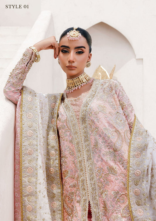 Refined katan silk ensemble with embroidered yoke, embellished borders, masoori silk pants, and a medium silk dupatta. Styled as open-front long shirt with crushed gharara or sharara.
