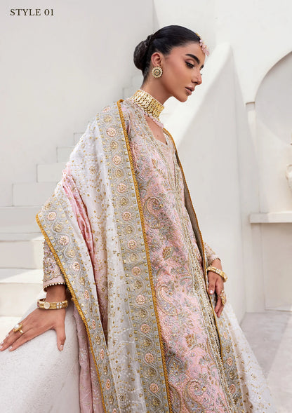 Refined katan silk ensemble with embroidered yoke, embellished borders, masoori silk pants, and a medium silk dupatta. Styled as open-front long shirt with crushed gharara or sharara.