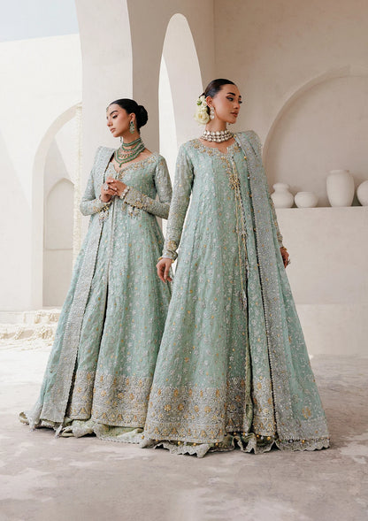 Elegant embroidered chiffon ensemble with embellished organza neckline, rich borders, jamawar pants, and chiffon dupatta. Styled as angrakha with skirt or kalidar open front with farshi gharara.