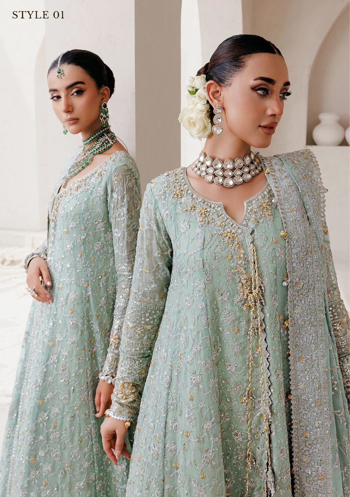 Elegant embroidered chiffon ensemble with embellished organza neckline, rich borders, jamawar pants, and chiffon dupatta. Styled as angrakha with skirt or kalidar open front with farshi gharara.