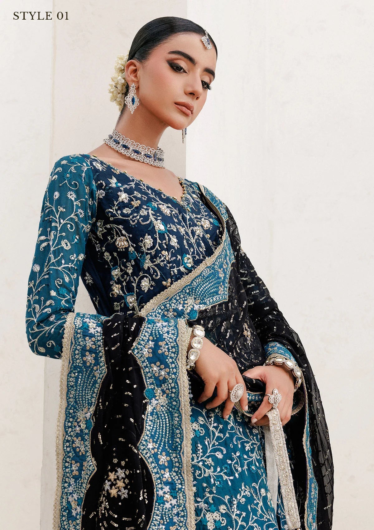 Elegant khaadi net ensemble with embellished bodice, organza and silk neckline finishing, masoori silk pants, and chiffon dupatta. Styled as angrakha with sharara or kalidar with skirt.