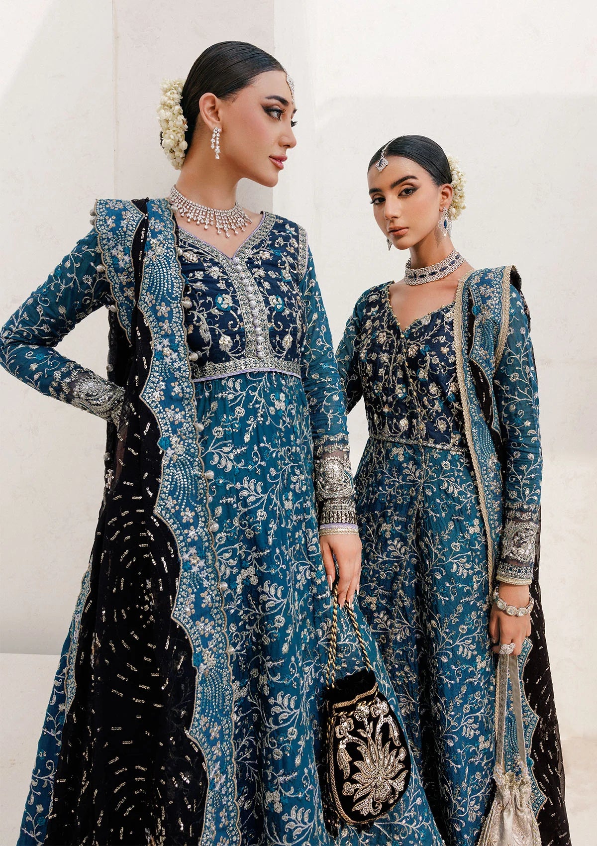 Elegant khaadi net ensemble with embellished bodice, organza and silk neckline finishing, masoori silk pants, and chiffon dupatta. Styled as angrakha with sharara or kalidar with skirt.