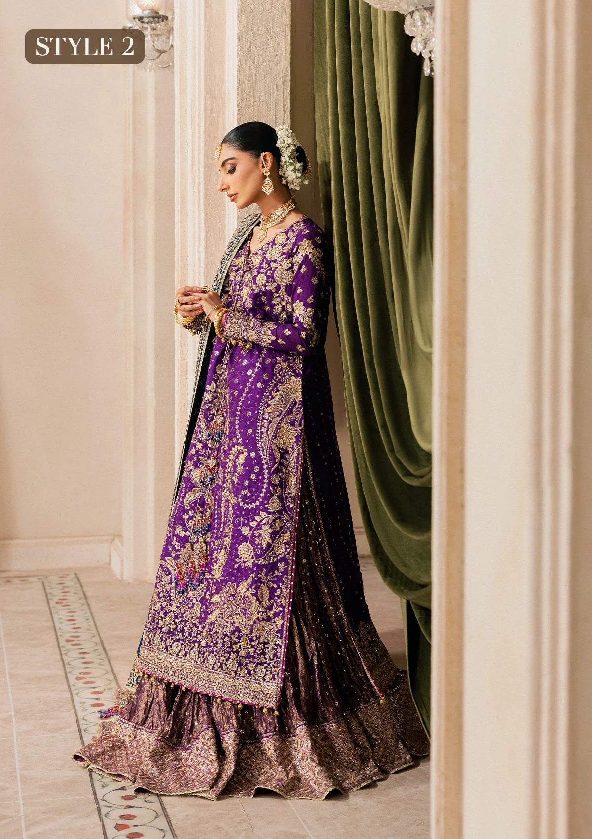 Elegant purple medium silk dress with embellished embroidery, organza borders and sleeves. Paired with masoori silk pants and embroidered silk dupatta.
