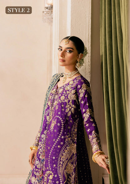 Elegant purple medium silk dress with embellished embroidery, organza borders and sleeves. Paired with masoori silk pants and embroidered silk dupatta.