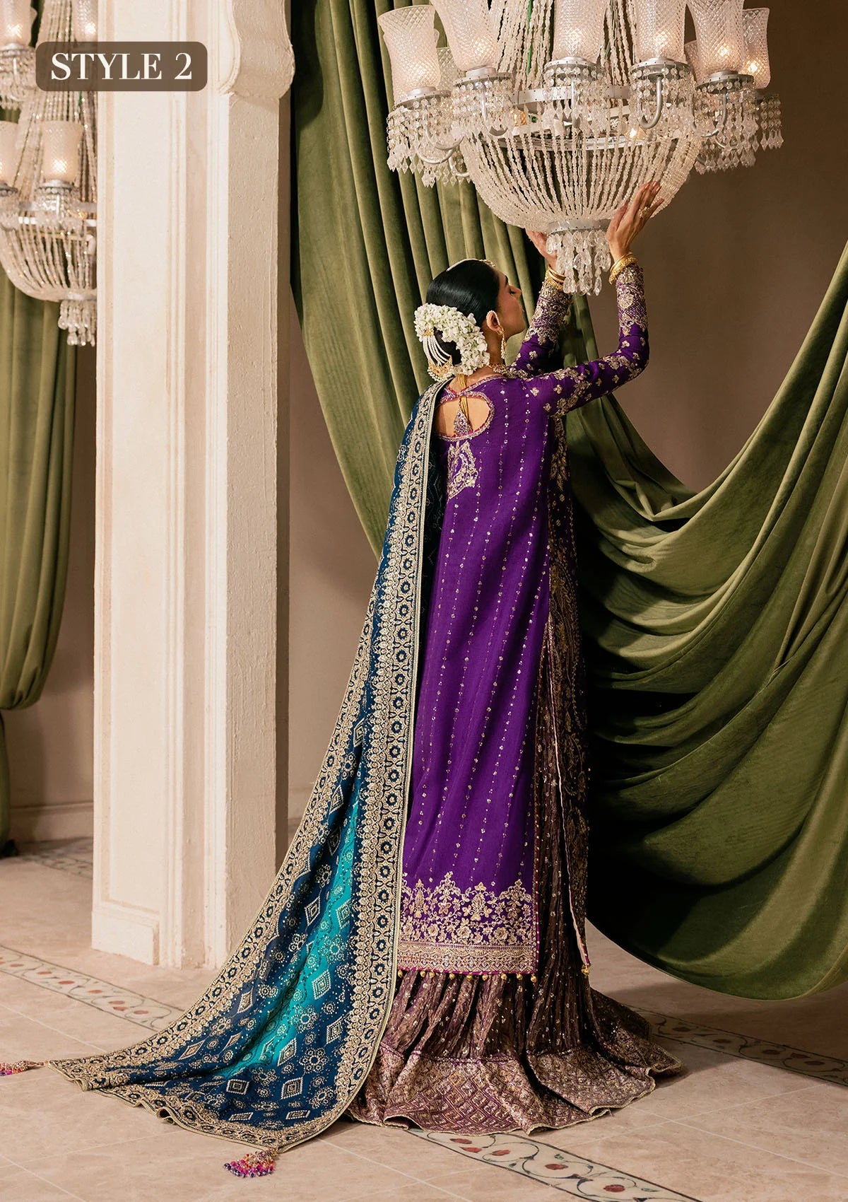 Elegant purple medium silk dress with embellished embroidery, organza borders and sleeves. Paired with masoori silk pants and embroidered silk dupatta.