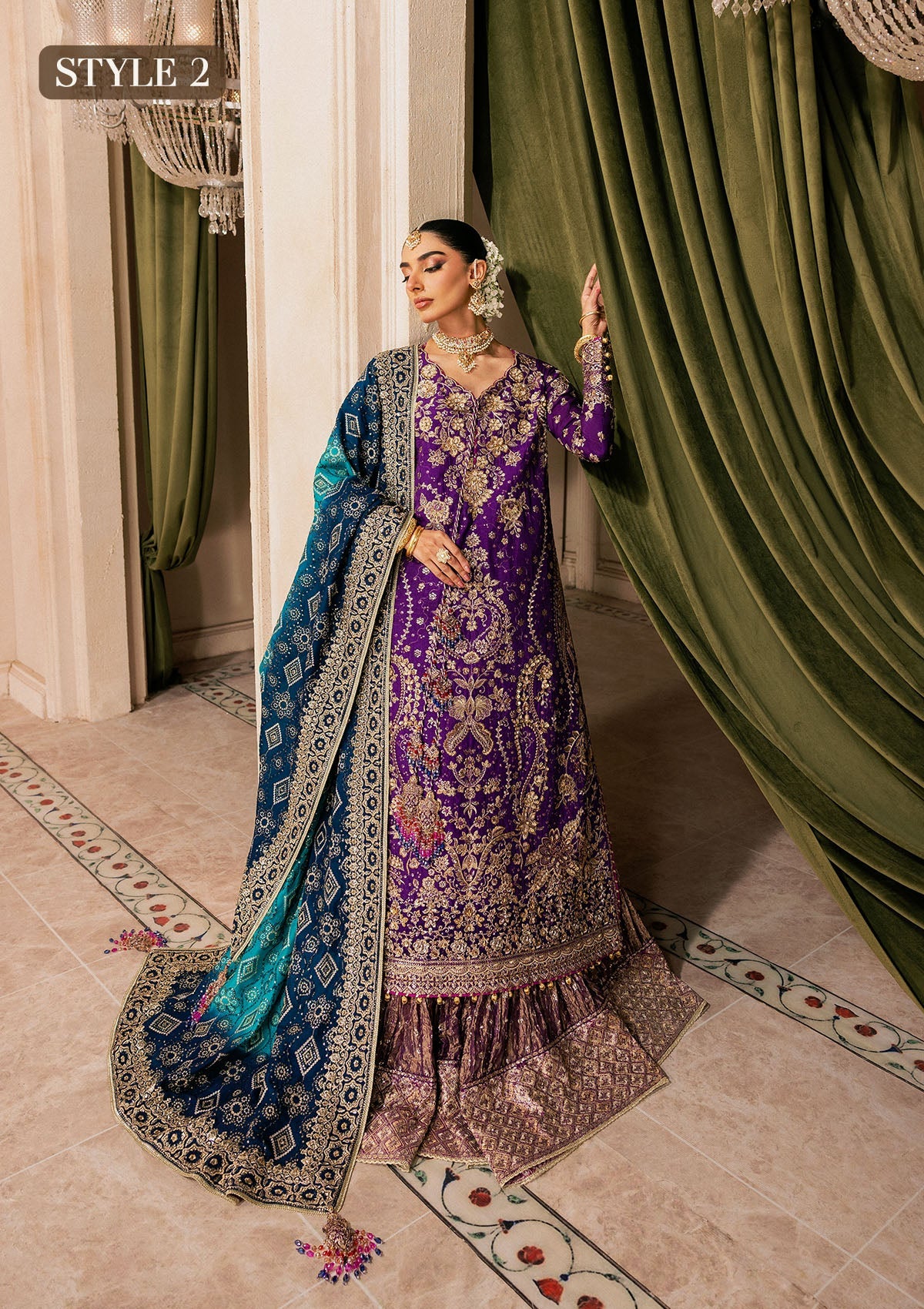 Elegant purple medium silk dress with embellished embroidery, organza borders and sleeves. Paired with masoori silk pants and embroidered silk dupatta.