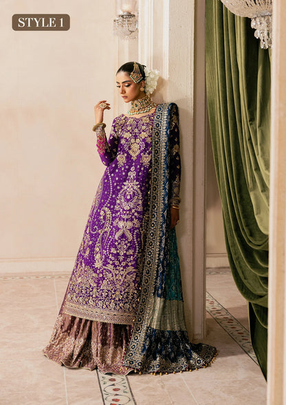 Elegant purple medium silk dress with embellished embroidery, organza borders and sleeves. Paired with masoori silk pants and embroidered silk dupatta.