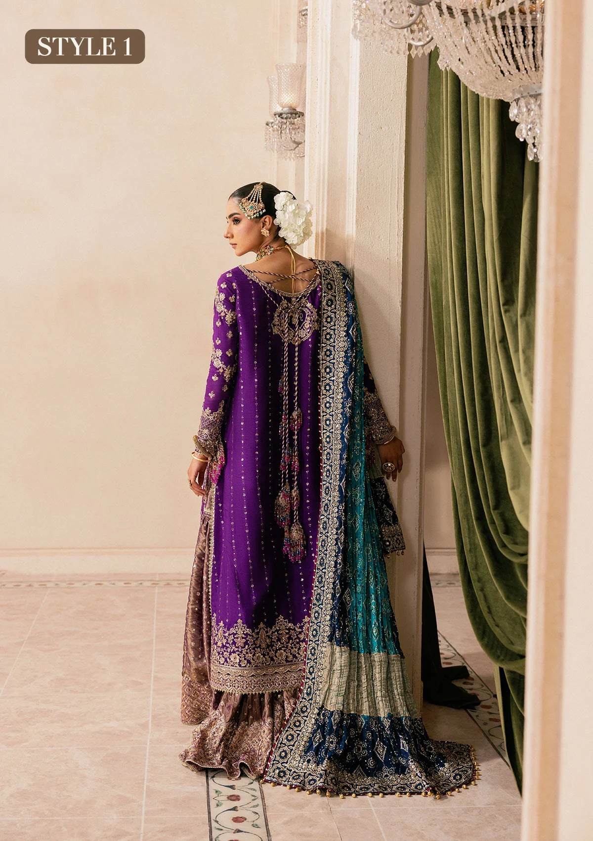 Elegant purple medium silk dress with embellished embroidery, organza borders and sleeves. Paired with masoori silk pants and embroidered silk dupatta.