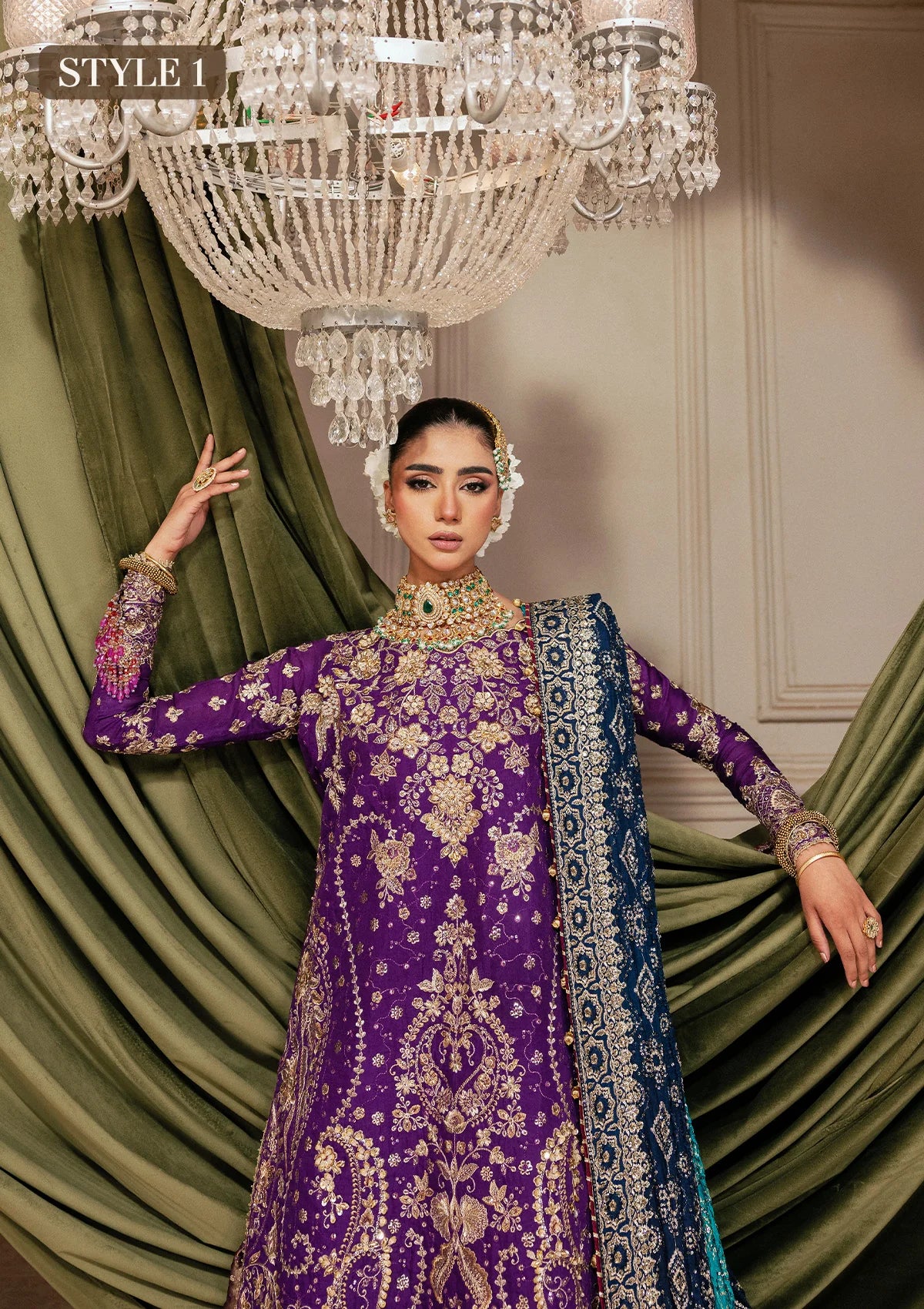 Elegant purple medium silk dress with embellished embroidery, organza borders and sleeves. Paired with masoori silk pants and embroidered silk dupatta.