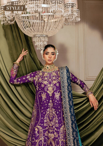 Elegant purple medium silk dress with embellished embroidery, organza borders and sleeves. Paired with masoori silk pants and embroidered silk dupatta.