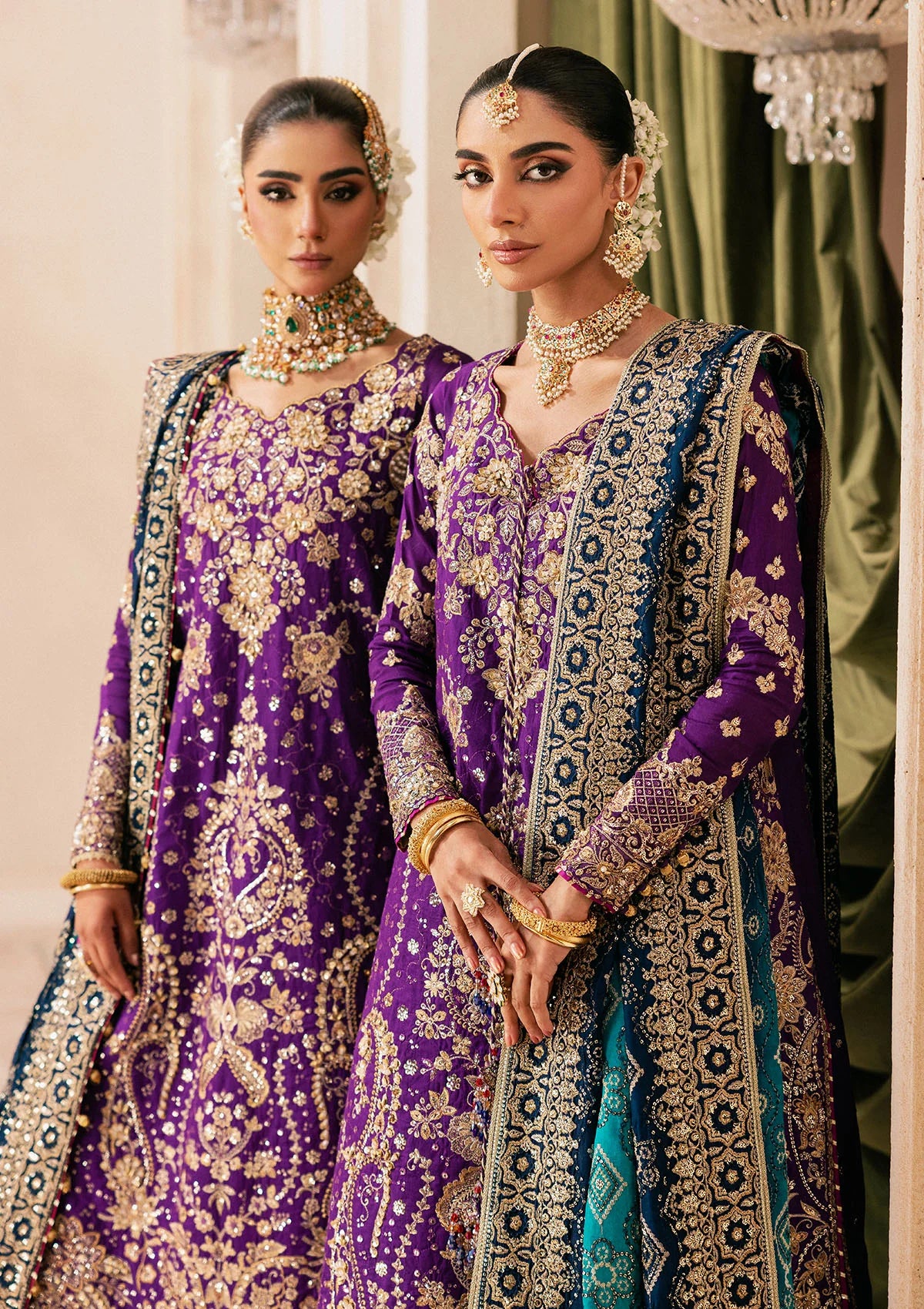 Elegant purple medium silk dress with embellished embroidery, organza borders and sleeves. Paired with masoori silk pants and embroidered silk dupatta.