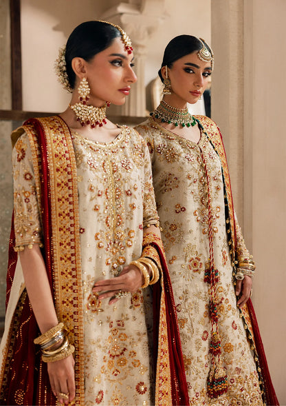 Elegant off white zari net dress with embellished embroidery, organza borders and sleeves. Paired with jamawar pants and chiffon dupatta.