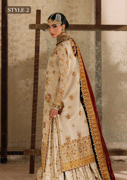 Elegant off white zari net dress with embellished embroidery, organza borders and sleeves. Paired with jamawar pants and chiffon dupatta.