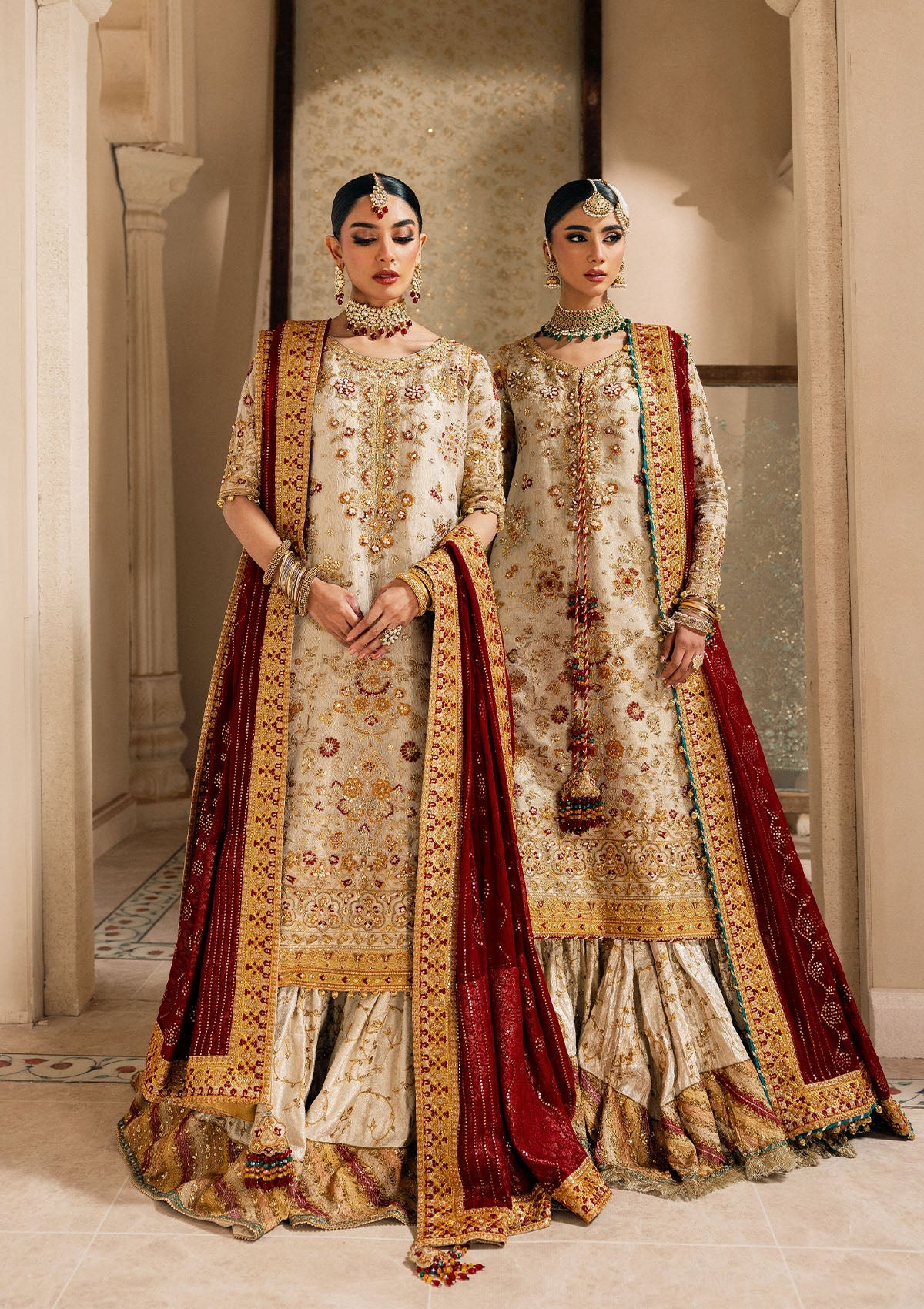 Elegant off white zari net dress with embellished embroidery, organza borders and sleeves. Paired with jamawar pants and chiffon dupatta.
