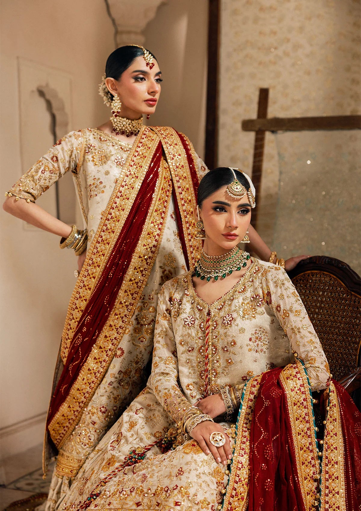Elegant off white zari net dress with embellished embroidery, organza borders and sleeves. Paired with jamawar pants and chiffon dupatta.