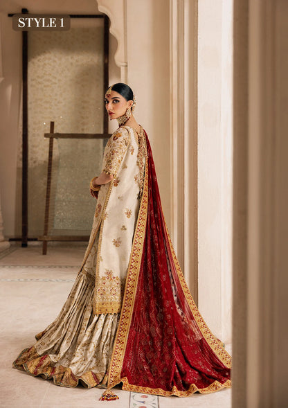 Elegant off white zari net dress with embellished embroidery, organza borders and sleeves. Paired with jamawar pants and chiffon dupatta.