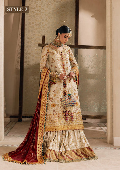 Elegant off white zari net dress with embellished embroidery, organza borders and sleeves. Paired with jamawar pants and chiffon dupatta.