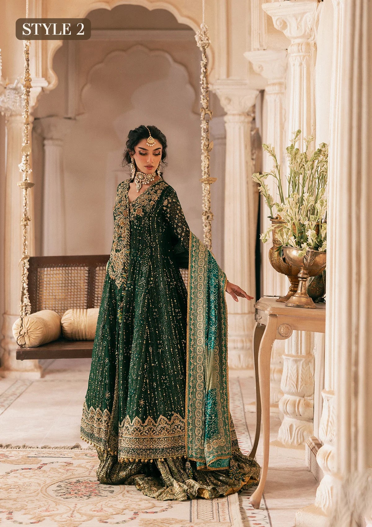 Elegant bottle green chiffon dress with embellished embroidery, organza borders and sleeves. Paired with jamawar pants and silk dupatta.