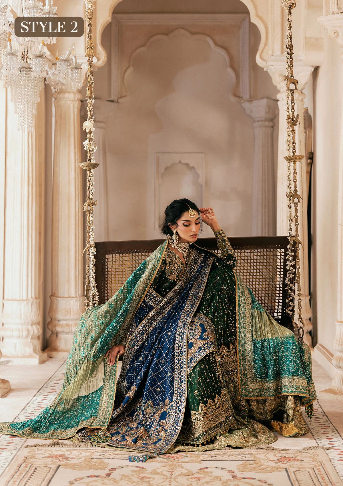 Elegant bottle green chiffon dress with embellished embroidery, organza borders and sleeves. Paired with jamawar pants and silk dupatta.