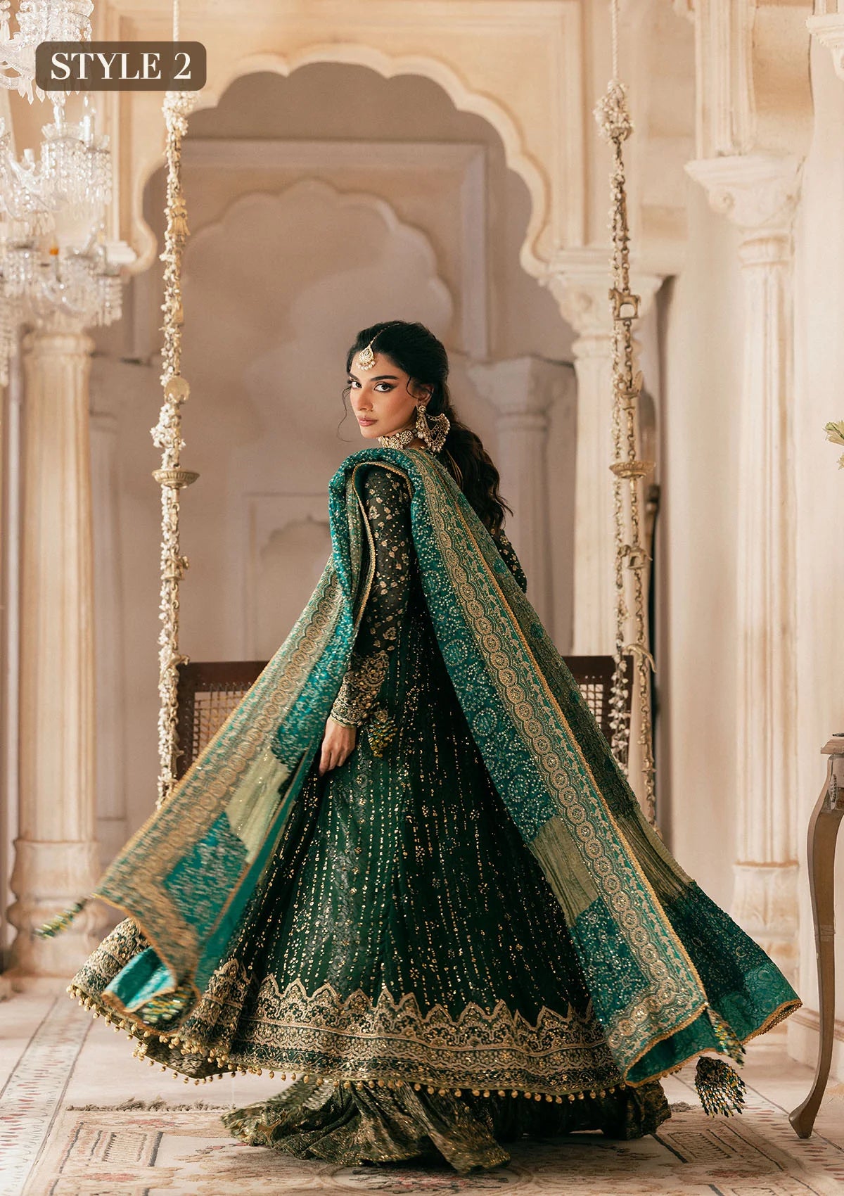 Elegant bottle green chiffon dress with embellished embroidery, organza borders and sleeves. Paired with jamawar pants and silk dupatta.