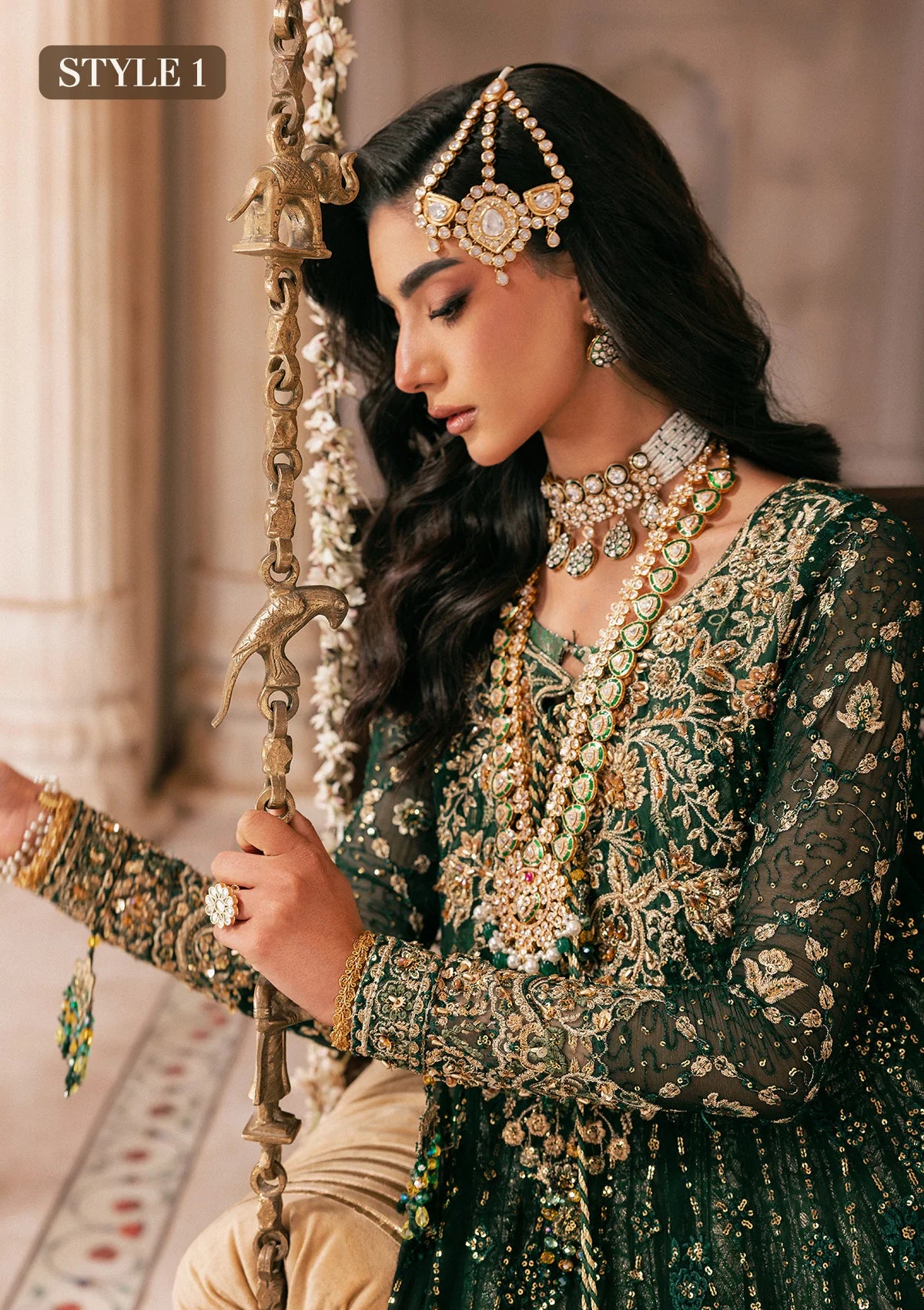 Elegant bottle green chiffon dress with embellished embroidery, organza borders and sleeves. Paired with jamawar pants and silk dupatta.