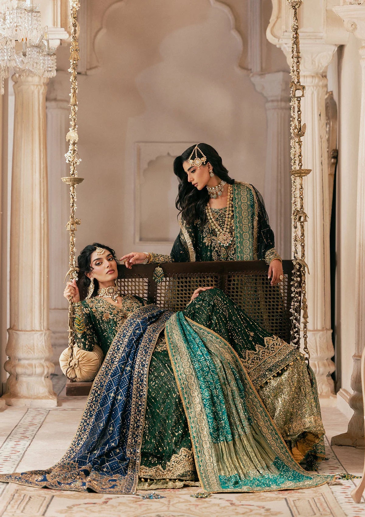 Elegant bottle green chiffon dress with embellished embroidery, organza borders and sleeves. Paired with jamawar pants and silk dupatta.