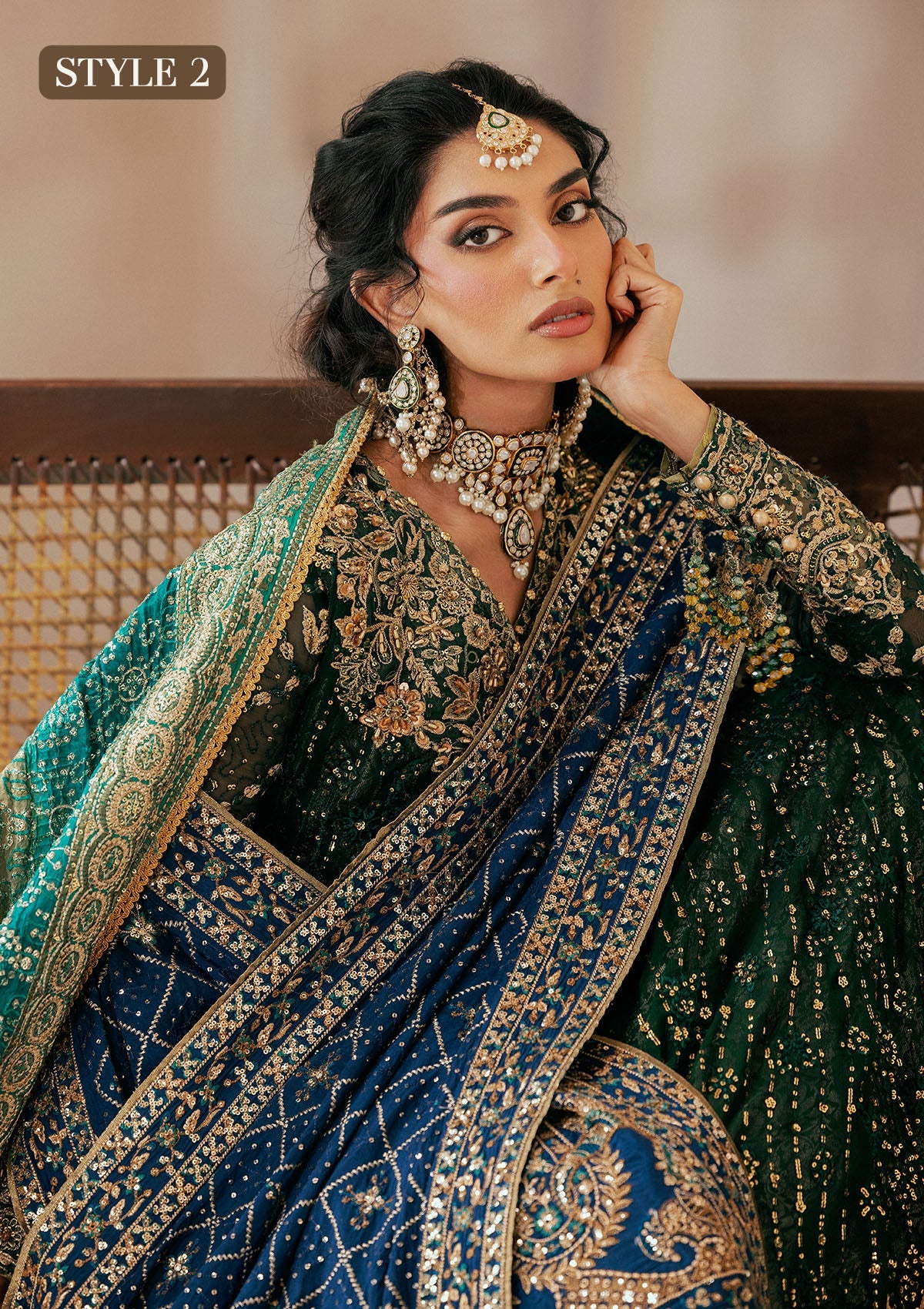 Elegant bottle green chiffon dress with embellished embroidery, organza borders and sleeves. Paired with jamawar pants and silk dupatta.