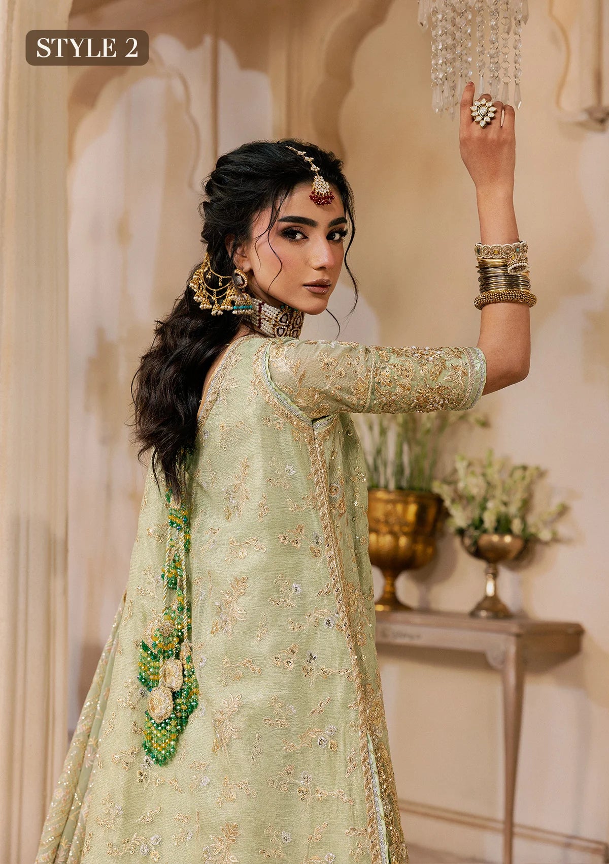 Shop mint green zari net embroidered dress with jamawar pants & chiffon dupatta. Features sharara & Hyderabadi gharara styles—perfect festive wear.