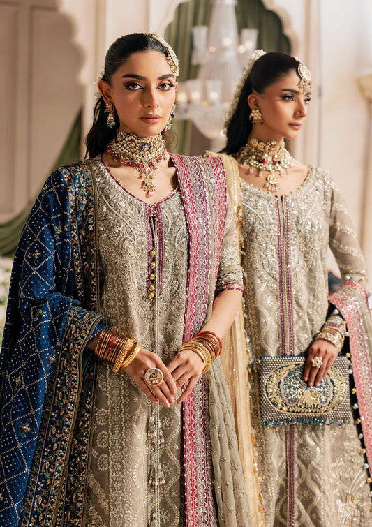 Shop grey khaadi net embroidered dress with masoori pants & chiffon dupatta. Features long shirt with gharara or open front skirt style—perfect festive wear.