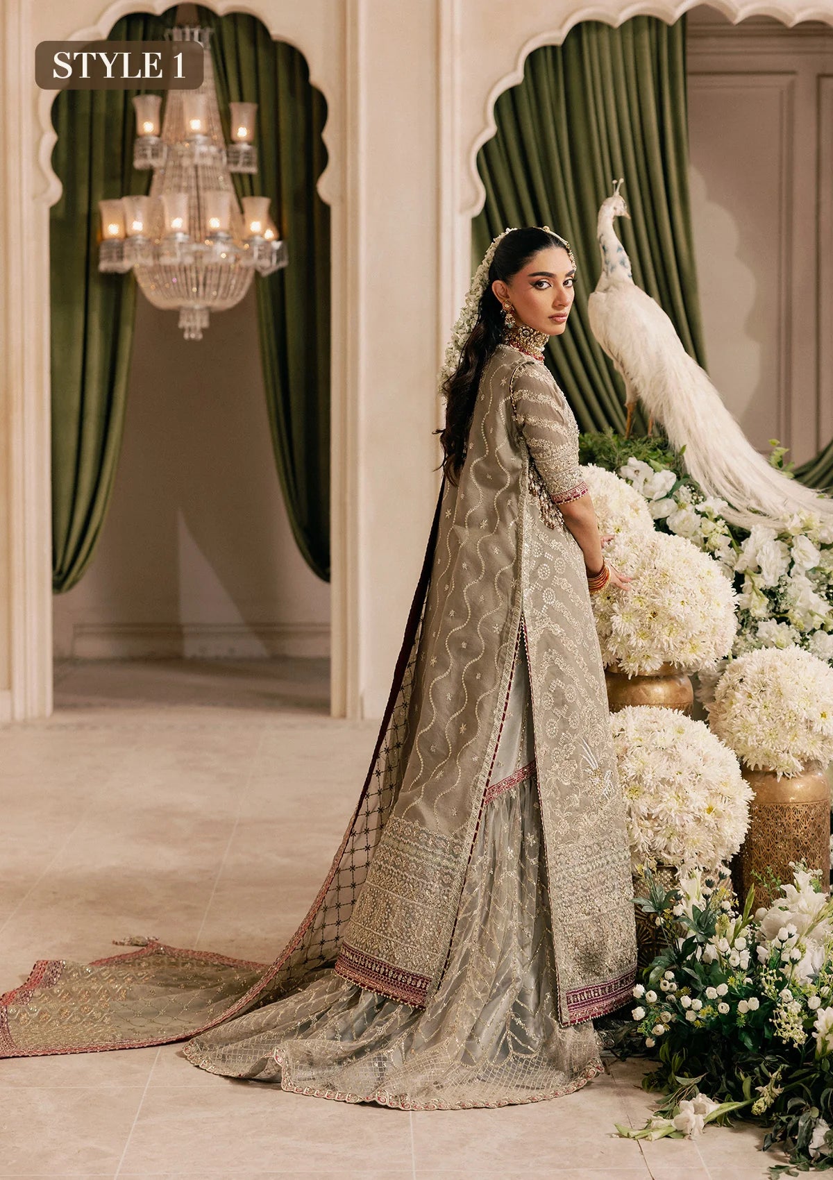 Shop grey khaadi net embroidered dress with masoori pants & chiffon dupatta. Features long shirt with gharara or open front skirt style—perfect festive wear.