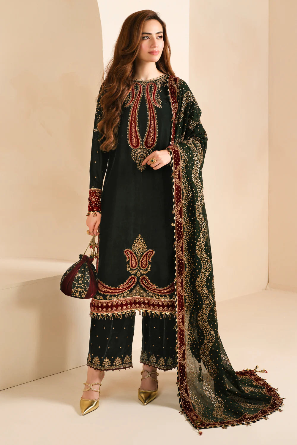 Elegant pure velvet formal dress with rich embroidery and chiffon dupatta. Unstitched luxury outfit designed to elevate your festive and formal style.