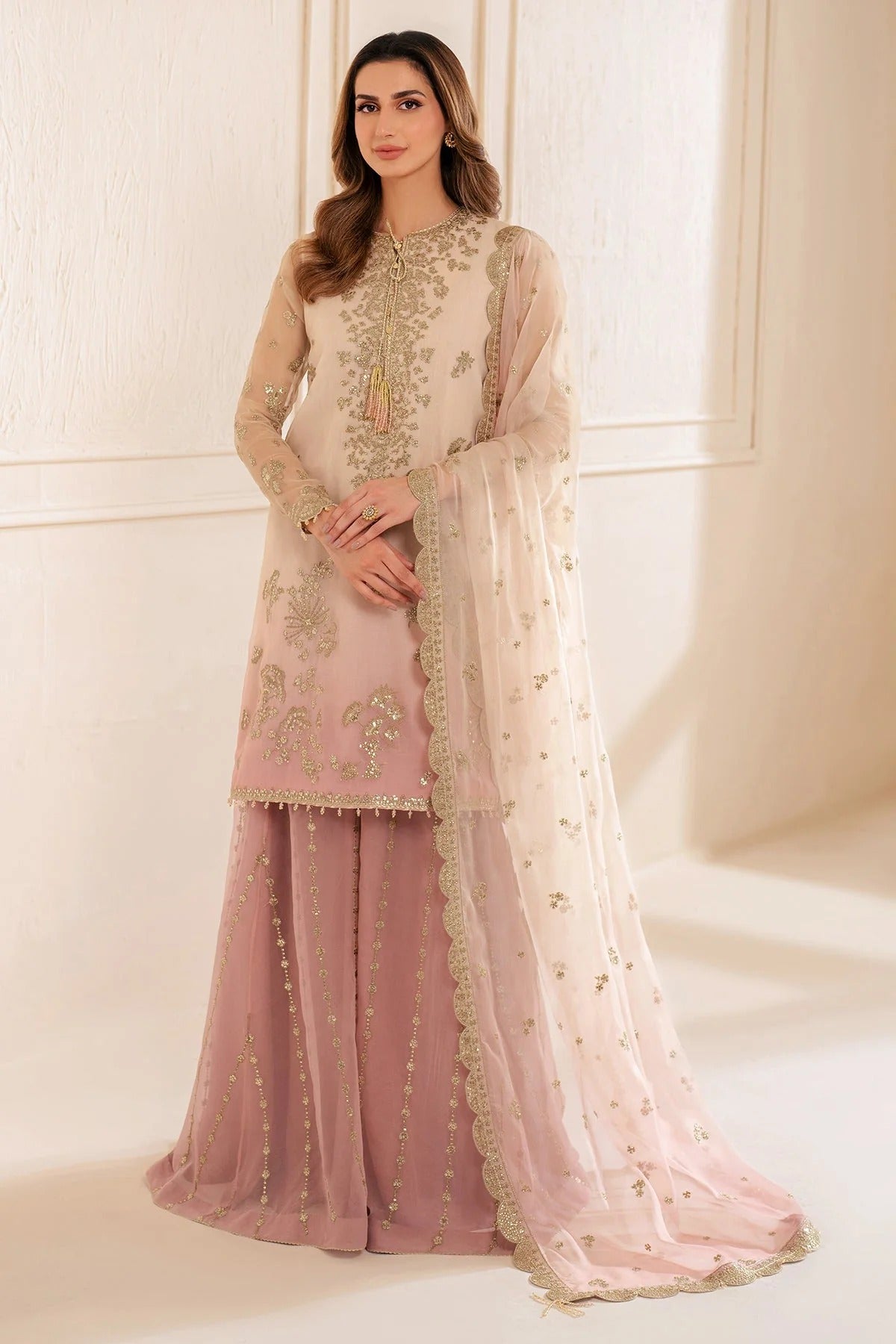 UC-3067 features digital printed chiffon with fine embroidery on front, sleeves, and dupatta—paired with a dyed rawsilk bottom for a refined look.