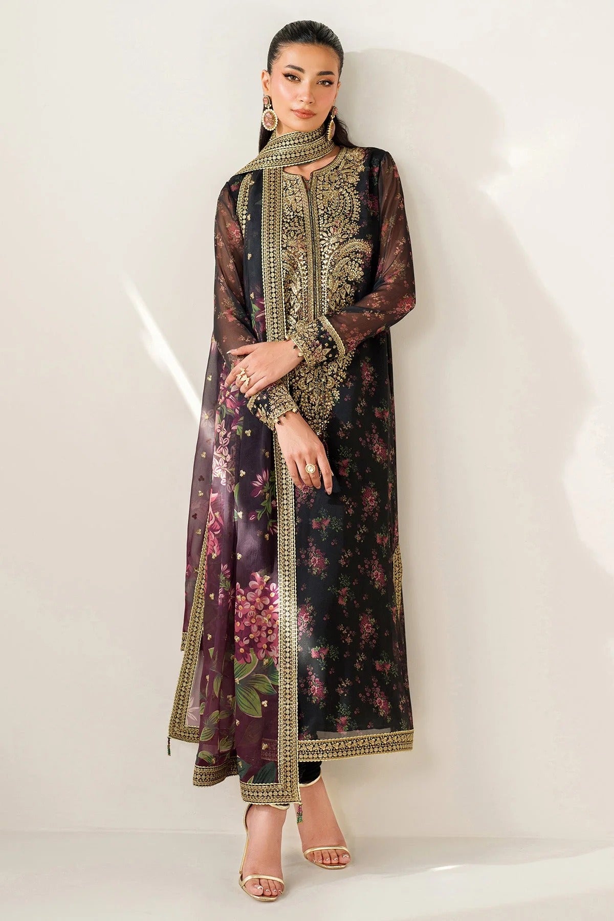 Digitally printed chiffon suit with intricate embroidery, bordered dupatta, and raw silk bottom—perfect for a graceful, formal, and timeless look.