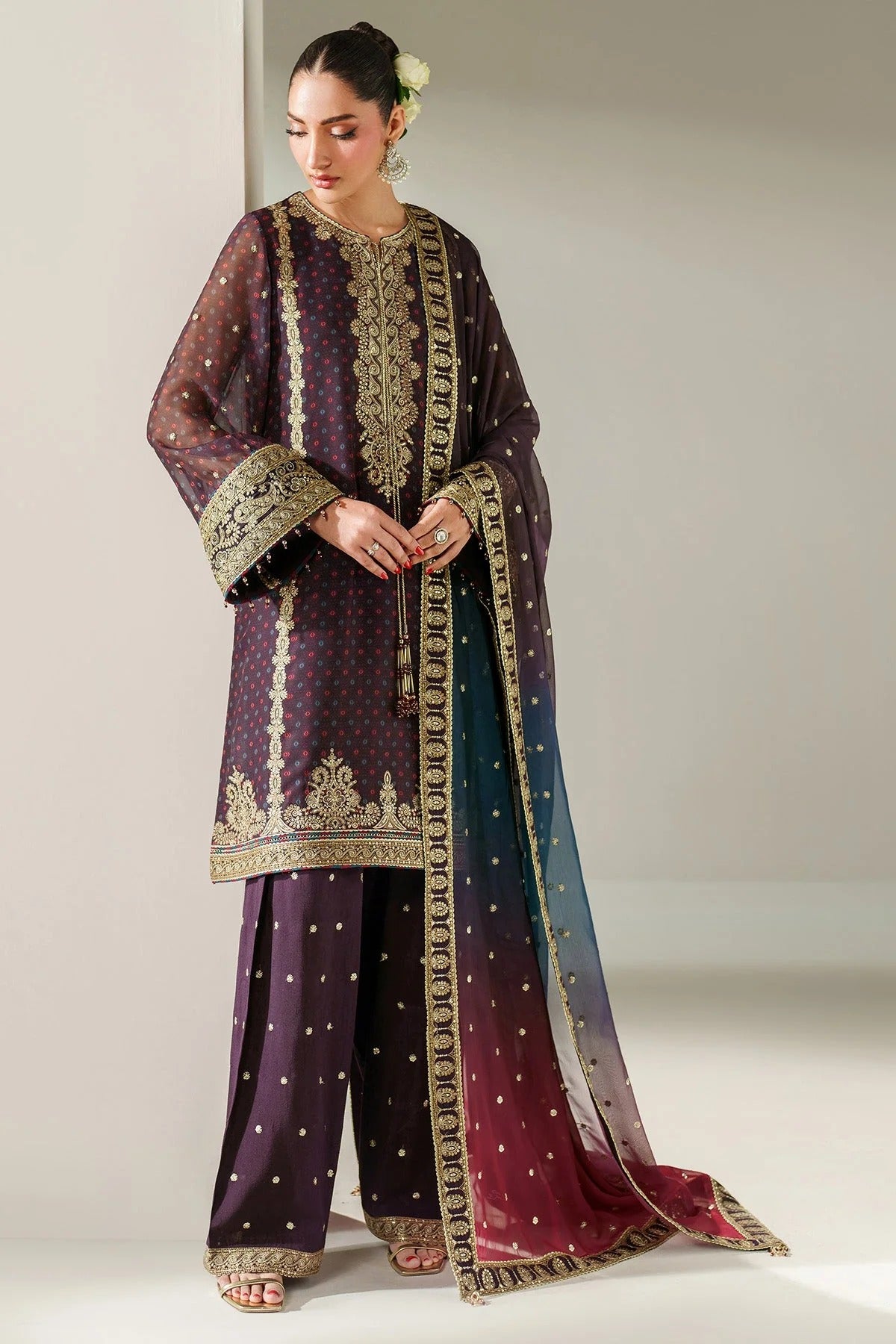 Elegantly embroidered chiffon with digital prints, bordered dupatta, and raw silk bottom—crafted for refined charm at weddings, events, or formal soirées.
