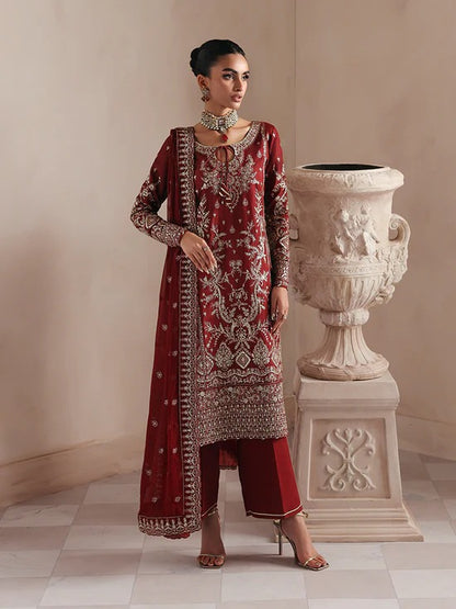 Elegant raw silk dress featuring intricate embroidered and sequined panels, borders, and chiffon dupatta. Includes organza accents and dyed silk trouser.