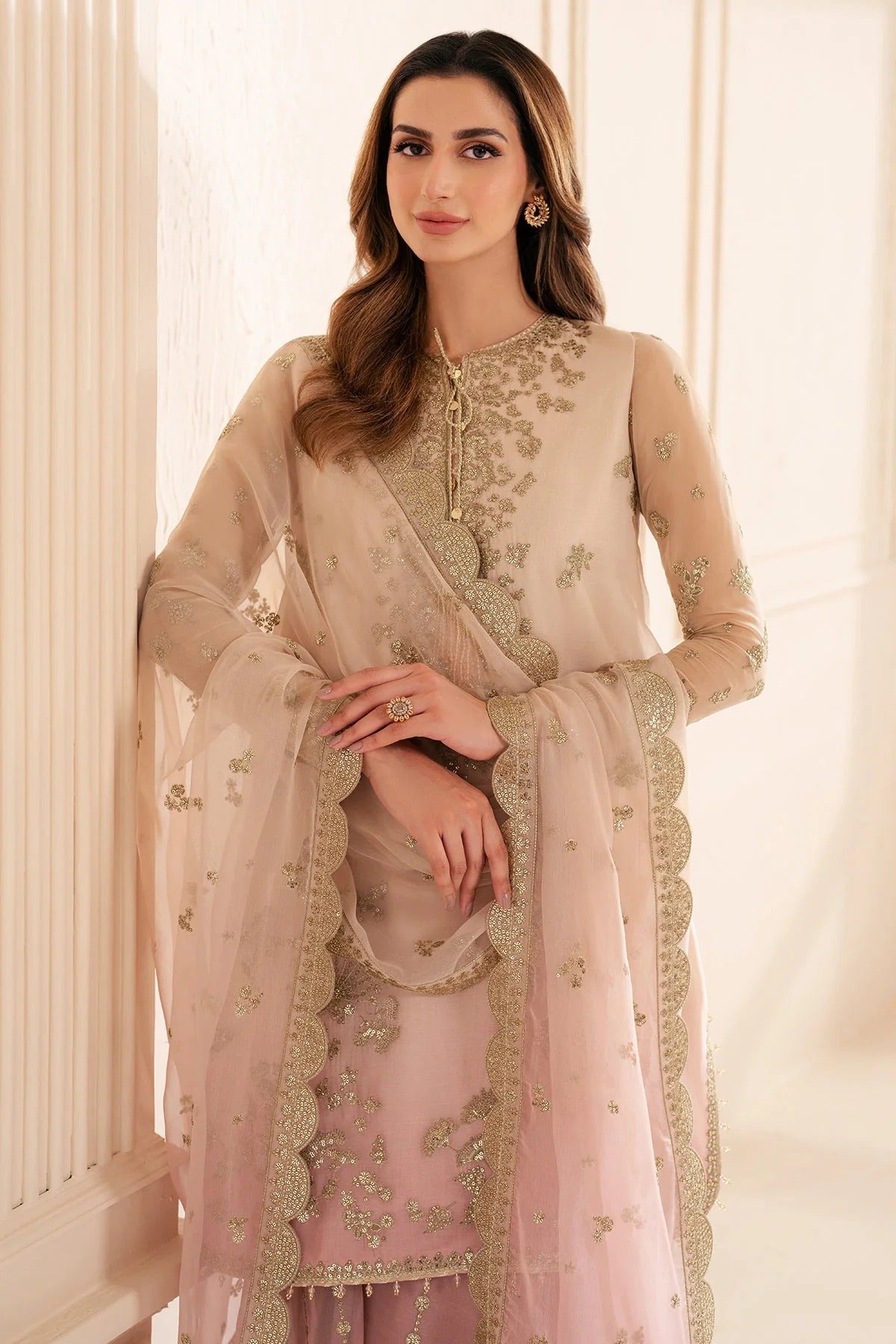 UC-3067 features digital printed chiffon with fine embroidery on front, sleeves, and dupatta—paired with a dyed rawsilk bottom for a refined look.
