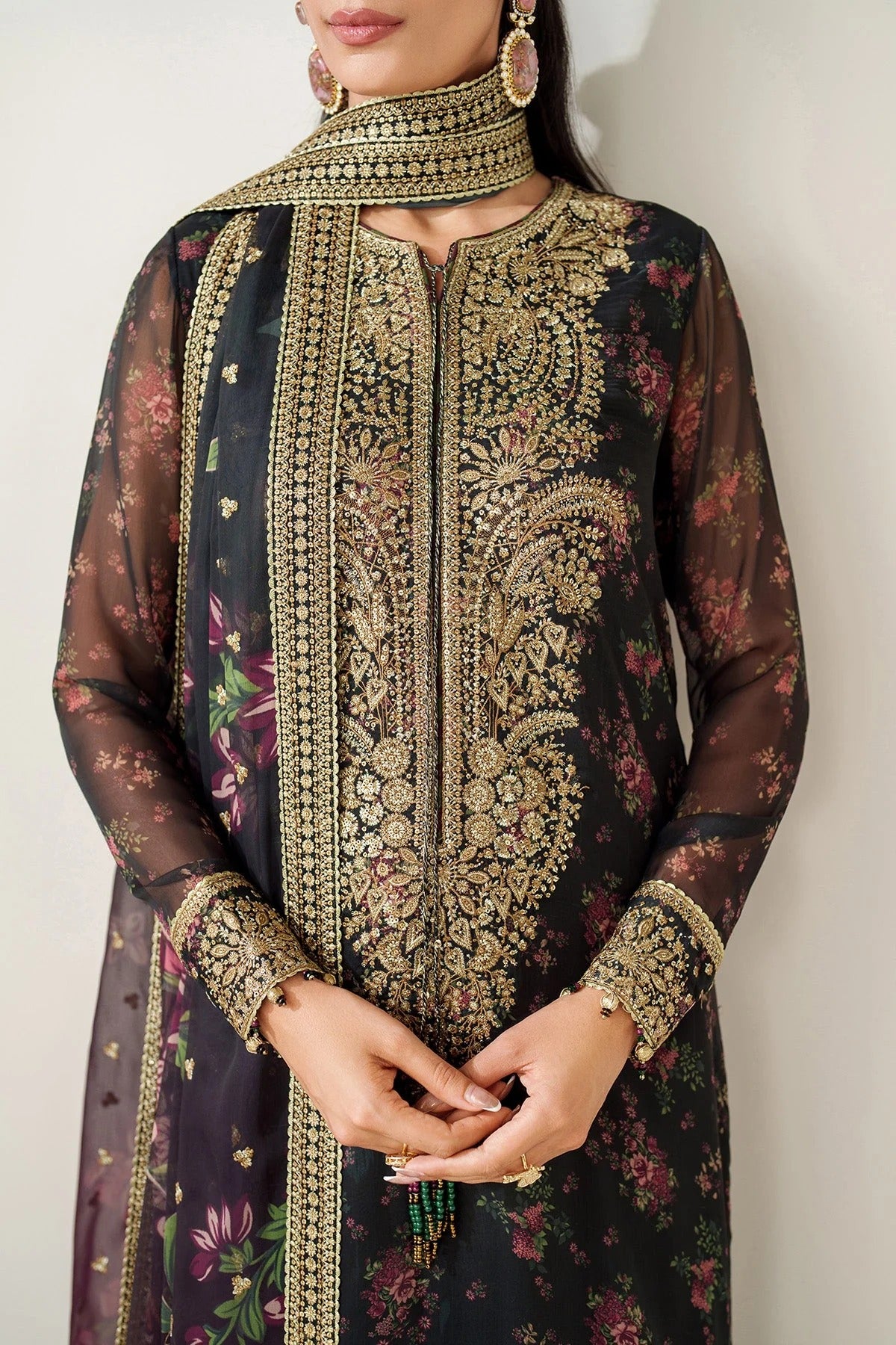 Digitally printed chiffon suit with intricate embroidery, bordered dupatta, and raw silk bottom—perfect for a graceful, formal, and timeless look.