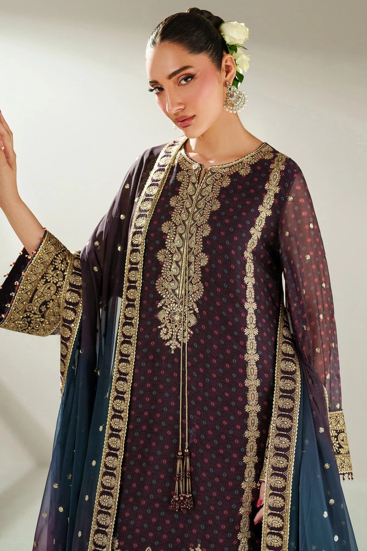 Elegantly embroidered chiffon with digital prints, bordered dupatta, and raw silk bottom—crafted for refined charm at weddings, events, or formal soirées.
