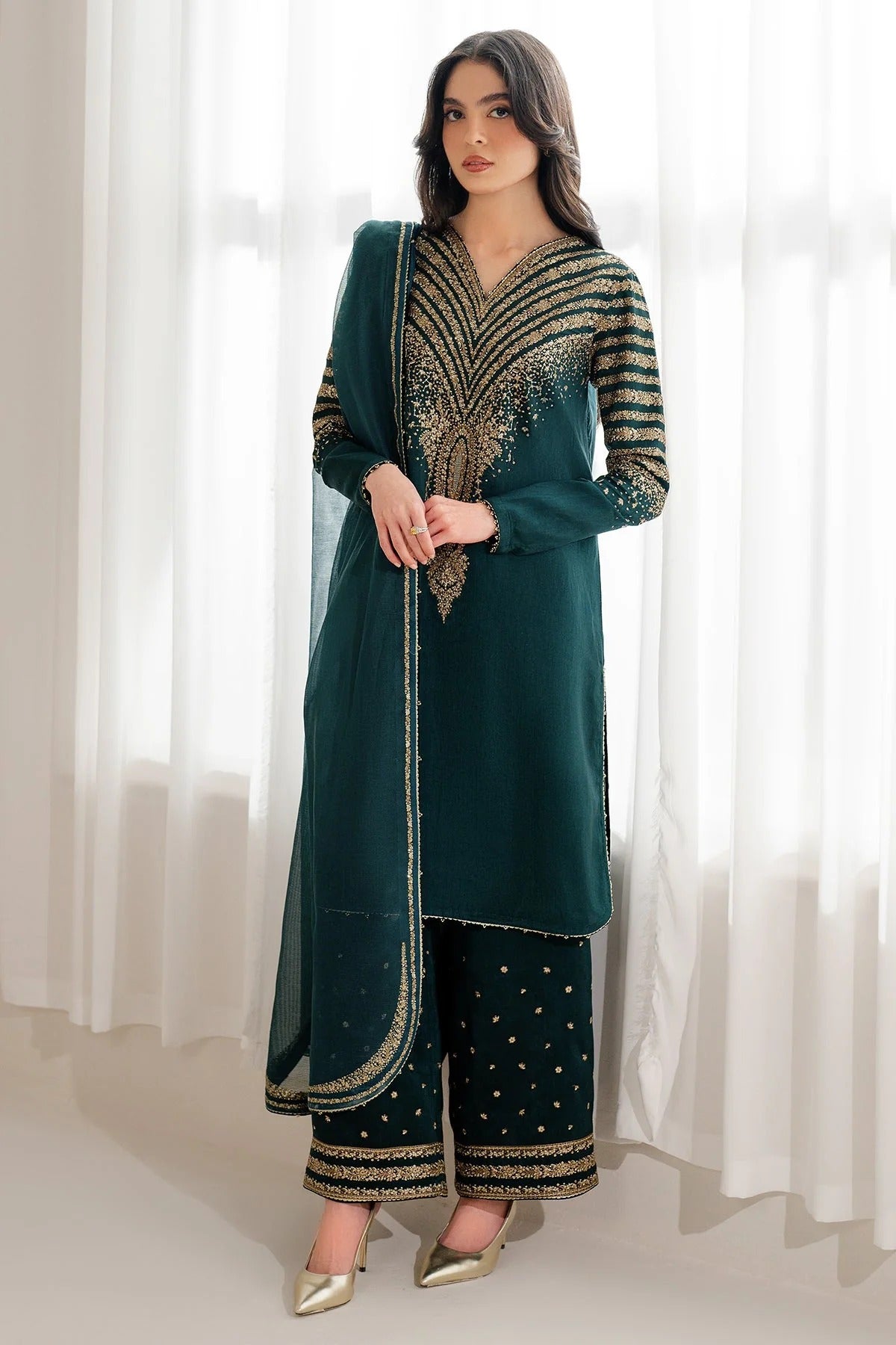 UR-7056 features embroidered Korean rawsilk front, sleeves, and bottom with a check woven organza dupatta—crafted for elegant, formal occasions.