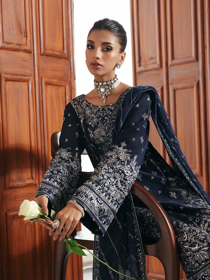 Stunning raw silk sharara dress with hand-embroidered and sequined panels, chiffon dupatta, and organza borders—crafted for luxury festive and bridal wear.