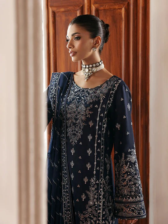 Stunning raw silk sharara dress with hand-embroidered and sequined panels, chiffon dupatta, and organza borders—crafted for luxury festive and bridal wear.