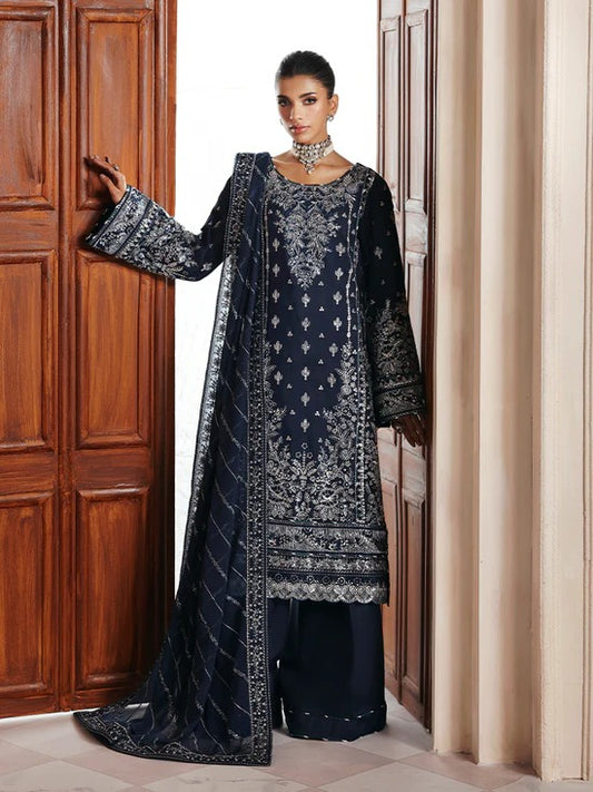 Stunning raw silk sharara dress with hand-embroidered and sequined panels, chiffon dupatta, and organza borders—crafted for luxury festive and bridal wear.