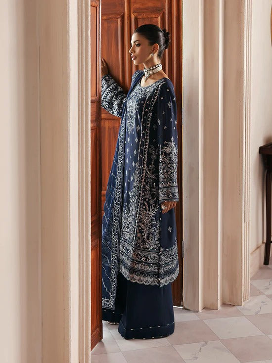 Stunning raw silk sharara dress with hand-embroidered and sequined panels, chiffon dupatta, and organza borders—crafted for luxury festive and bridal wear.