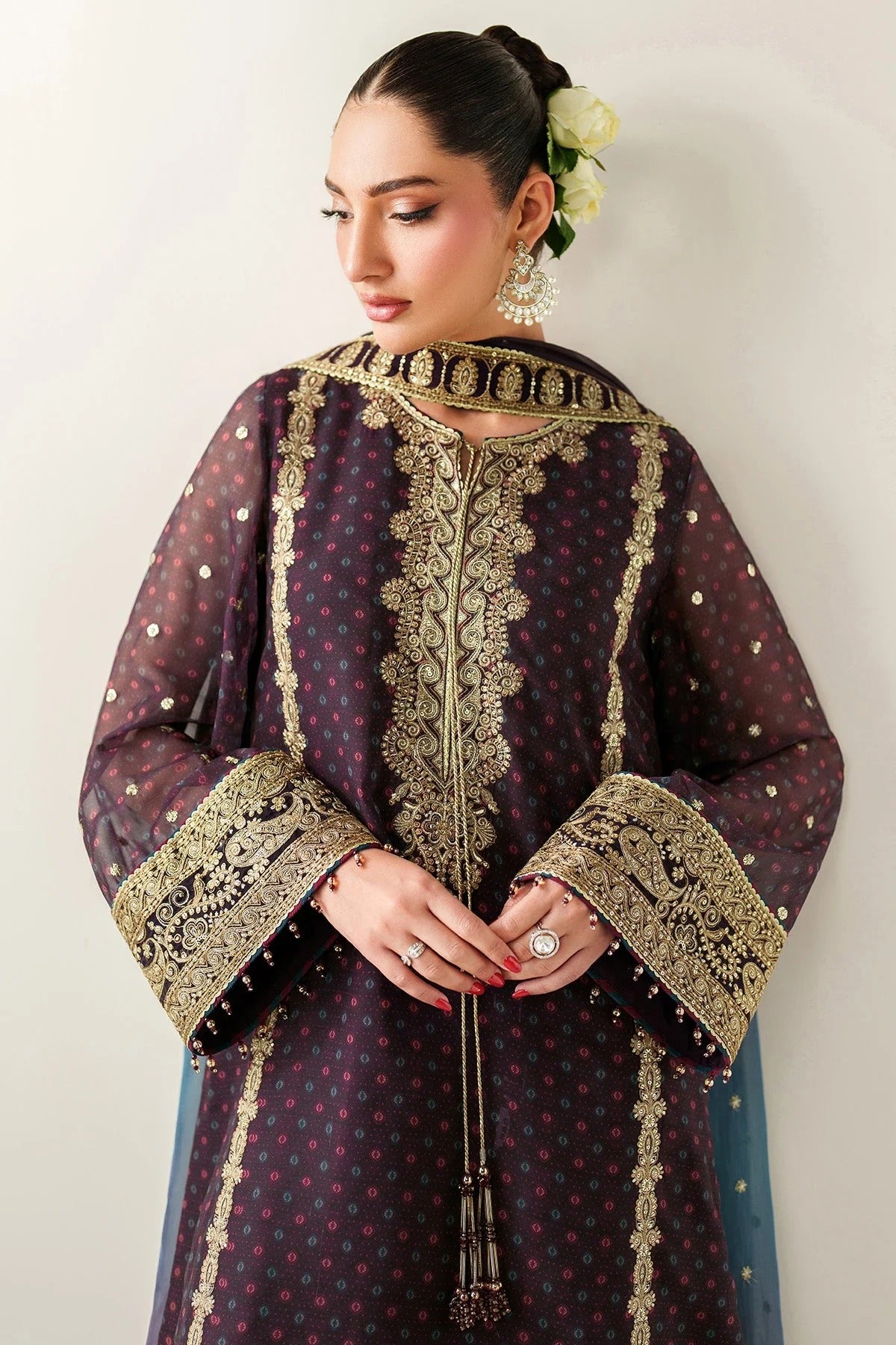 Elegantly embroidered chiffon with digital prints, bordered dupatta, and raw silk bottom—crafted for refined charm at weddings, events, or formal soirées.